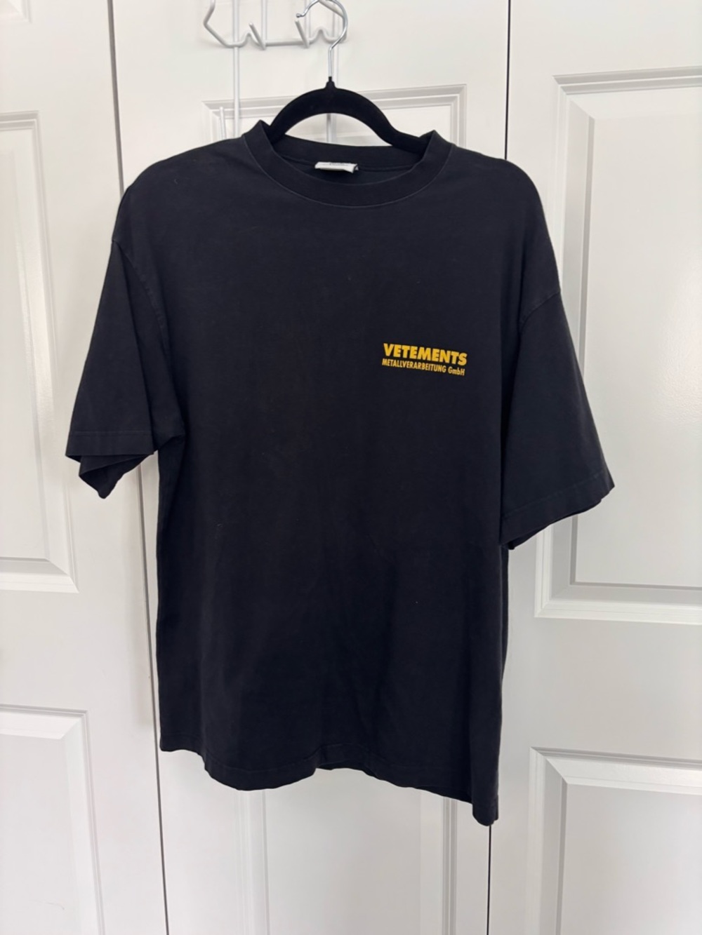 Vetements Black Short-Sleeve Tee with Yellow Chest Logo